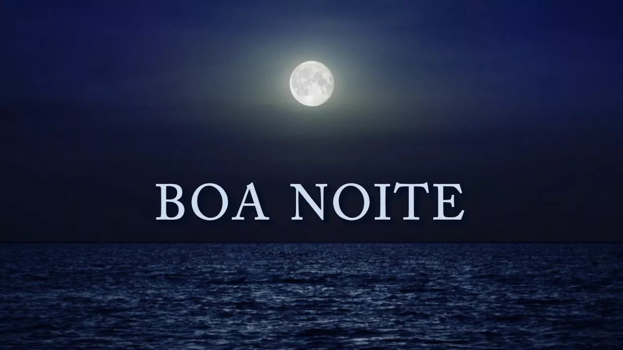 Lua sobre o mar com mensagem de boa noite